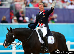 Carl Hester of Great Britain riding Uthopia celebrates after competing in the Team Dressage Grand Prix Special on Day 11 of the London 2012 Olympic Games at Greenwich Park on Aug. 7, 2012