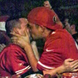 ‘Sports Illustrated’ Magazine Publishes A Cute Gay Kiss Photo . . . Without Irony